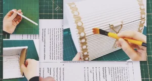 A handmade DIY treasure chest created from waste paper or recycled cardboard, styled as a decorative craft project for storage, gifting, or home decor.