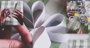 A handmade paper daisy garland made from simple paper strips, styled as cheerful spring decor for a wall, shelf, mantel, or party setup.