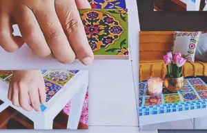 A DIY wooden stool makeover transformed into a stylish tile-top decor piece with a clean, modern, Pinterest-inspired look for budget home decor.