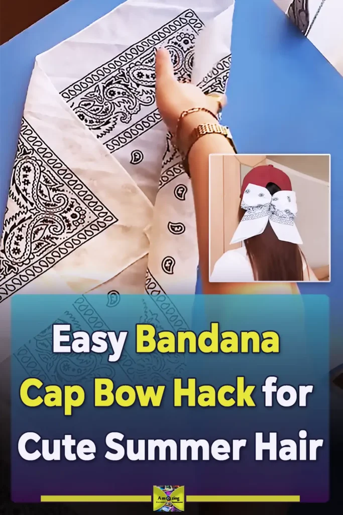 A black baseball cap worn backward with a large patterned bandana bow attached at the back, creating a cute no-sew hairstyle accessory.