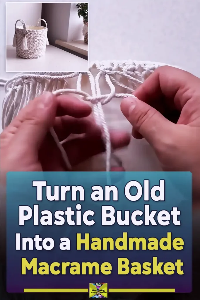 A handmade macrame storage basket made from a recycled plastic bucket, covered with cream rope knots, fabric lining, braided handles, and tassel accents.