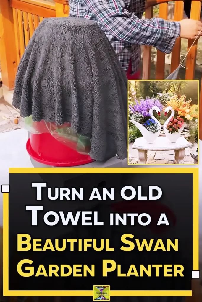 A handmade white swan-shaped cement planter made from an old towel and cement, with a curved neck, red beak, textured wing, and colorful flowers inside.