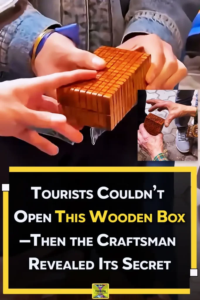 A skilled craftsman demonstrates an intricately carved wooden puzzle box with geometric details, concealed sliding panels, a hidden release mechanism, and a secret interior compartment.