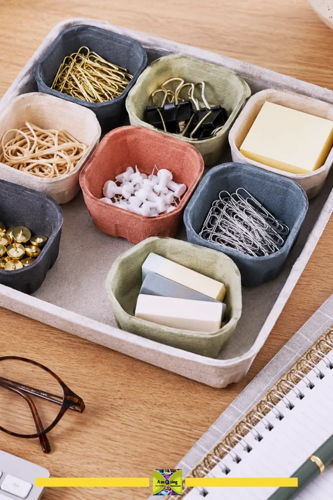 Modular desk-supply organizer made from egg carton cups holding pens and clips