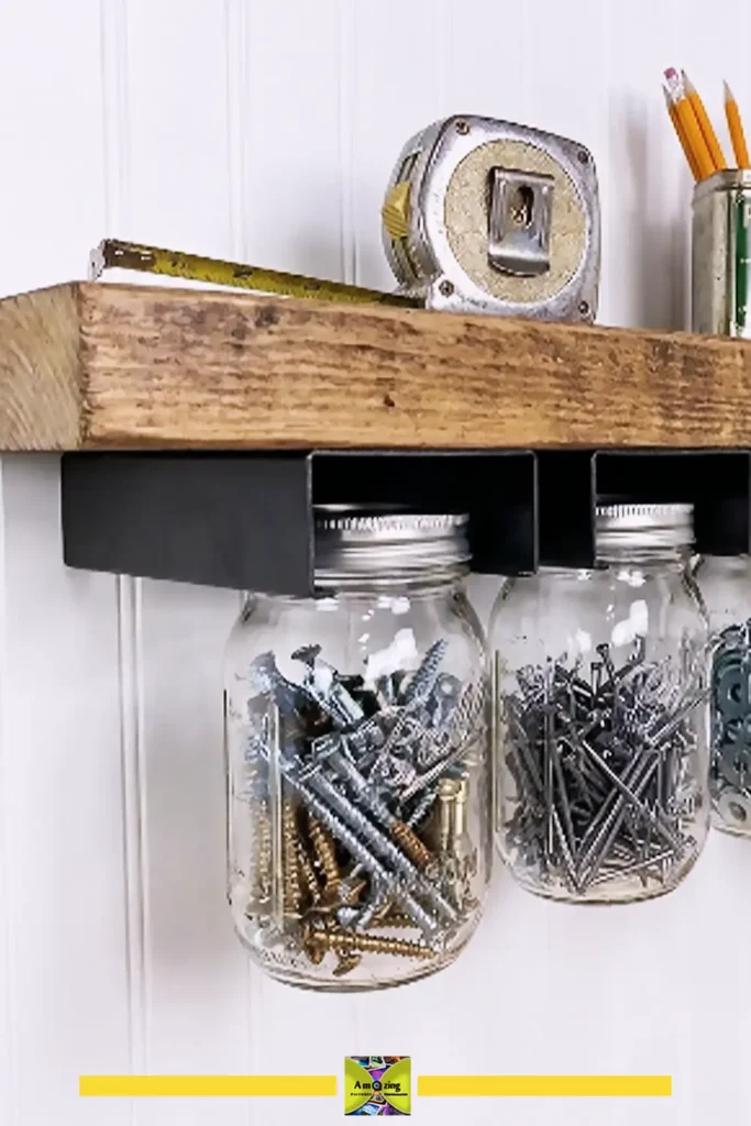 Pallet shelf with mason jar storage for organizing small workshop supplies