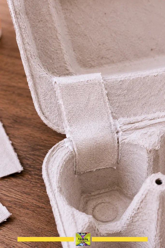 Egg carton cups reinforced with glue to strengthen weak points