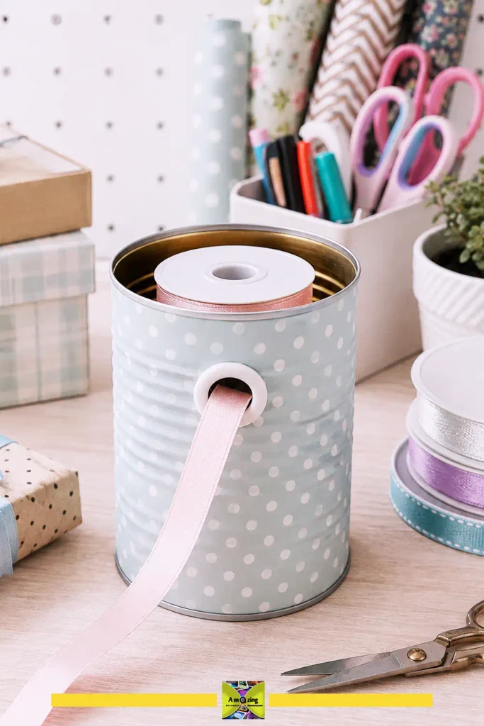 Tin can dispenser holding rolls of ribbon, yarn, and cord with strands feeding out