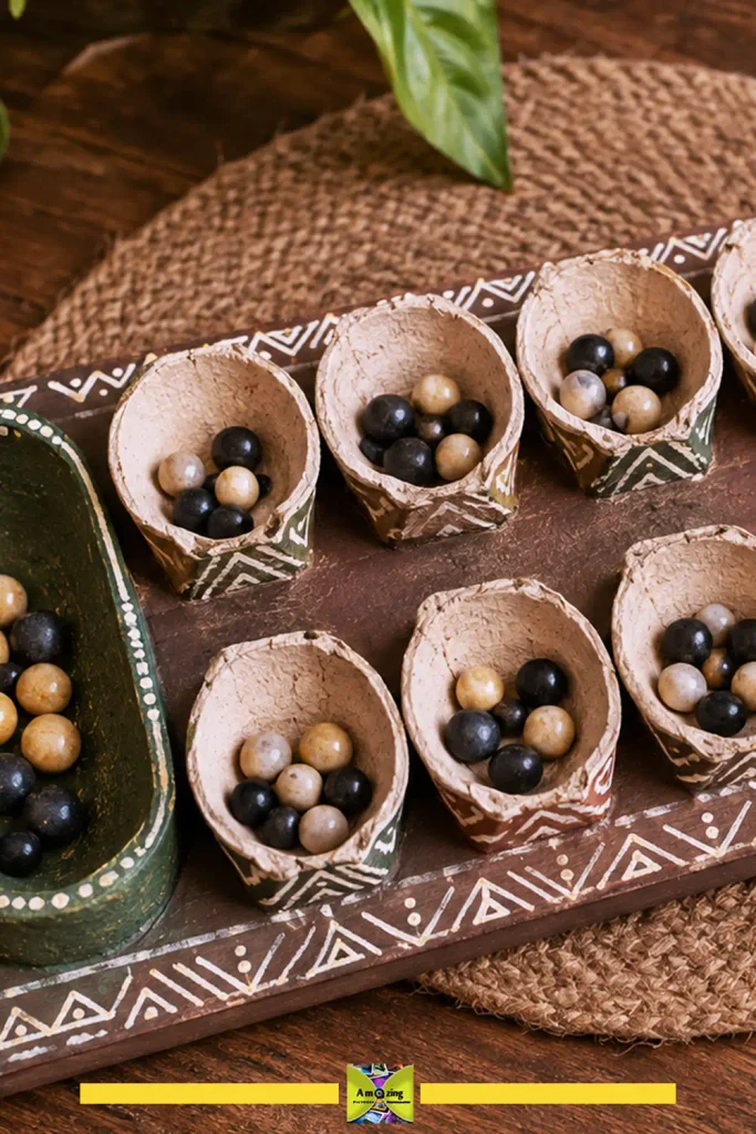 Tabletop mancala-style game board made from an egg carton with playing stones