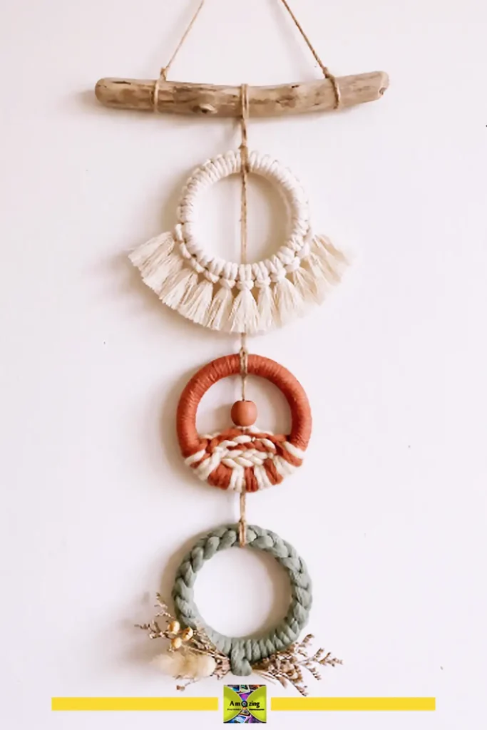 Three mini woven wall hangings made from upcycled bangles in coordinating cream tones