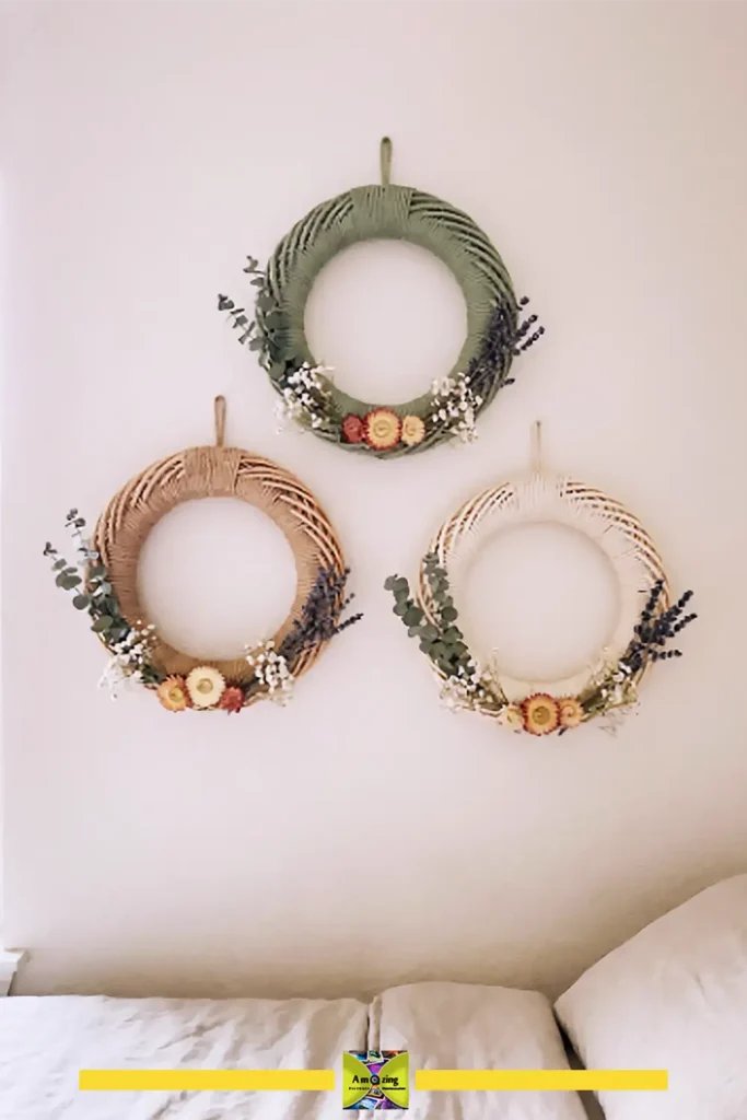 Trio of botanical summer wreaths made from old bangles wrapped in sage green with dried flowers