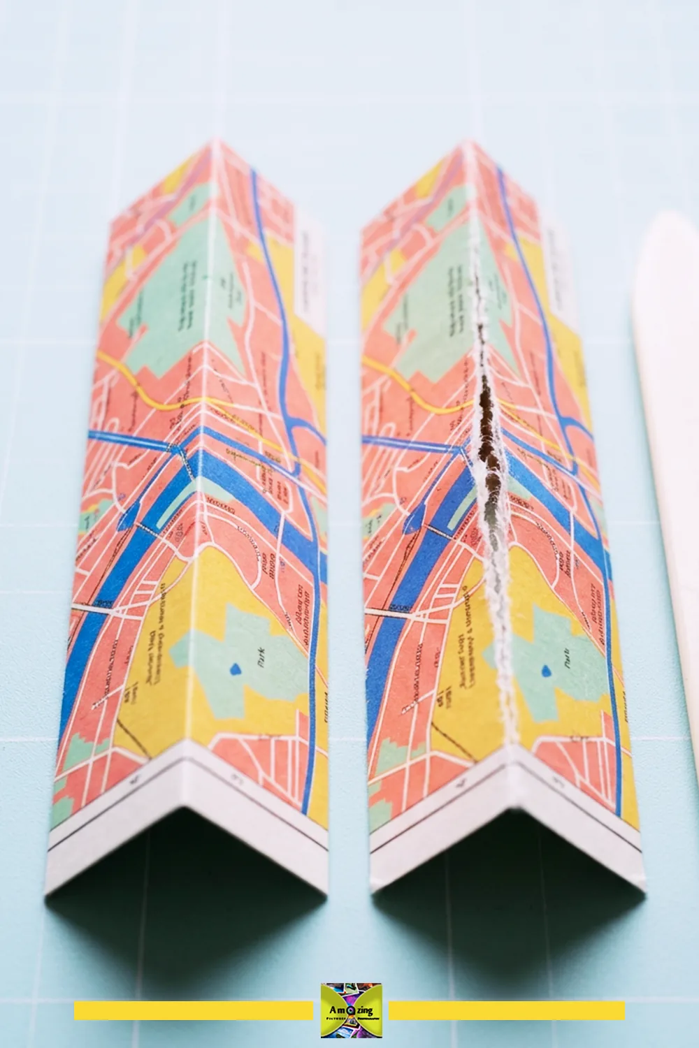 Two map-paper samples showing a clean scored fold and a torn fold.