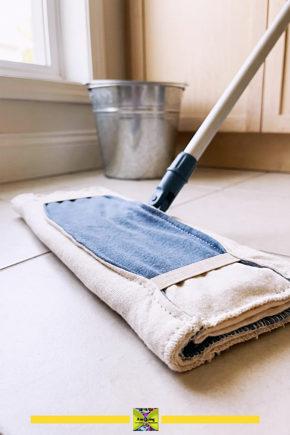 Close-up of a homemade reusable mop pad crafted from layered cotton t-shirt fabric on a tile floor.