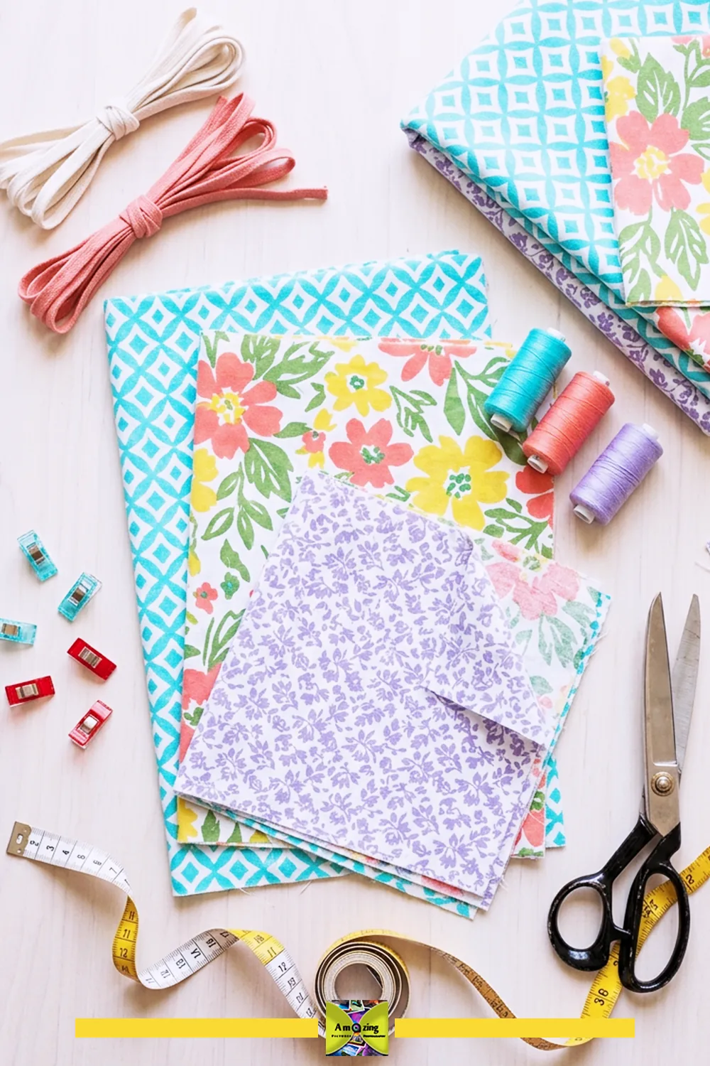 Assorted fabrics, threads, scissors, tape measure, and cords for making drawstring bags
