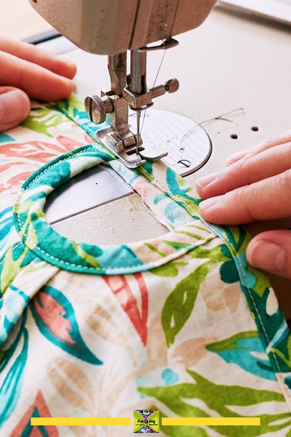 Hands sewing a colorful fabric dust cover on a sewing machine, focusing on the top opening.