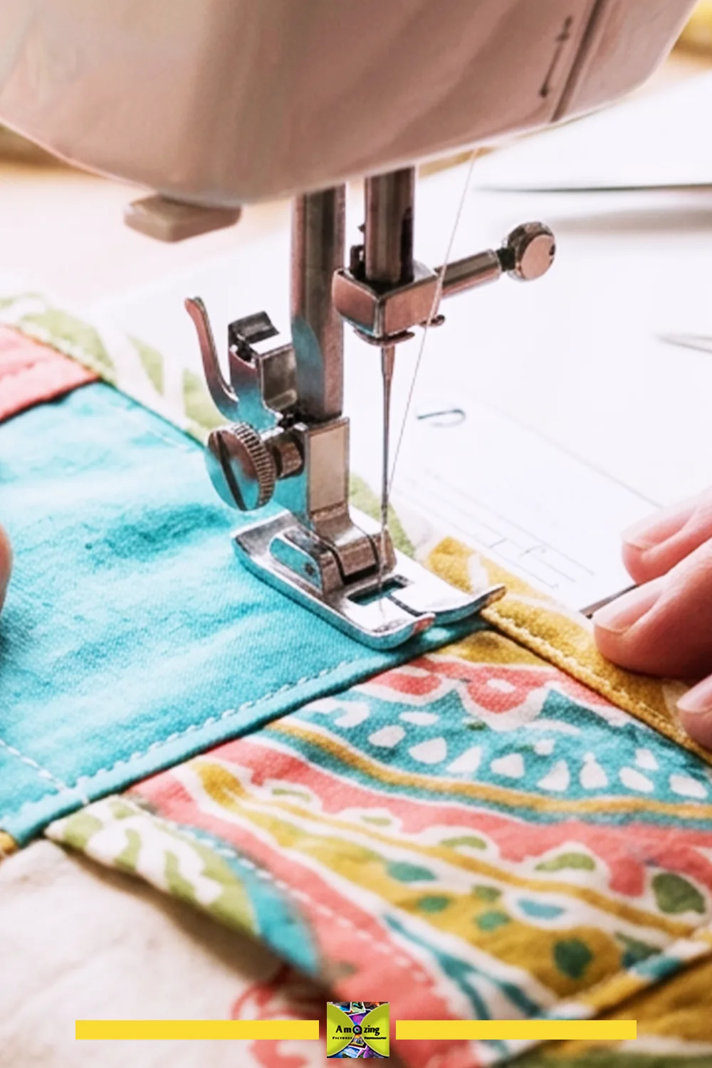 Close-up of sewing machine stitching colorful fabric pockets on a project mat