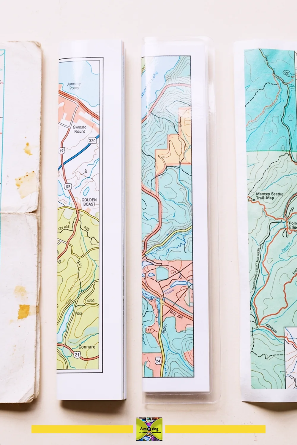 Map-paper samples arranged side by side to compare their surfaces and folds.