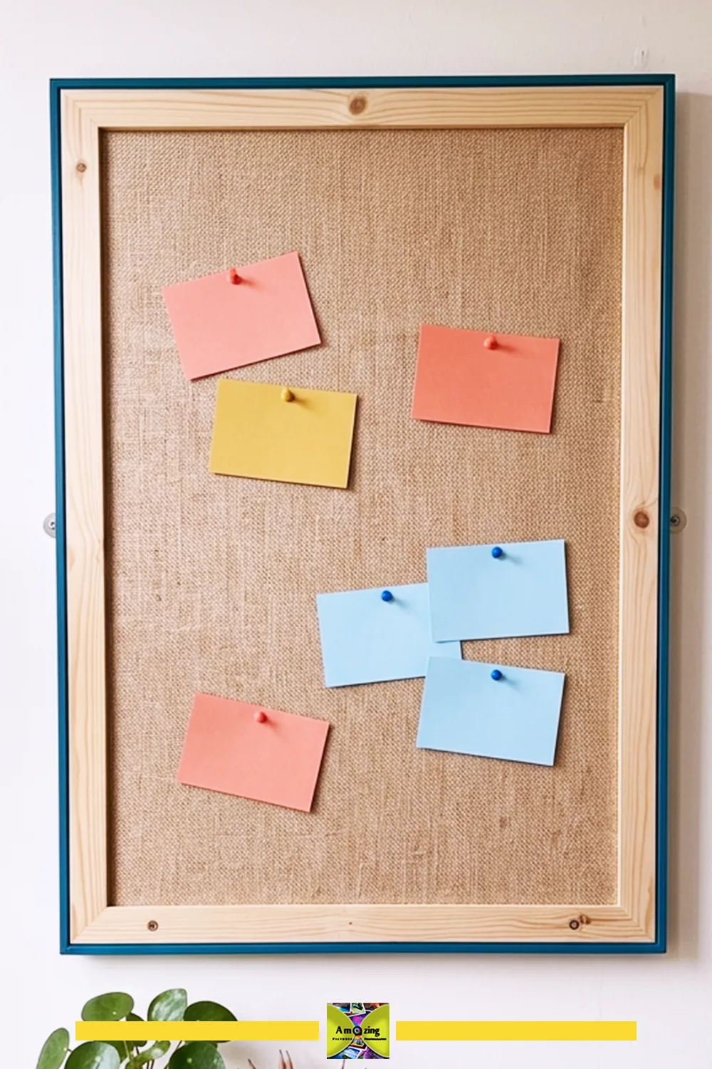 A cork pinboard with pastel pink, yellow, and blue notes pinned on it.