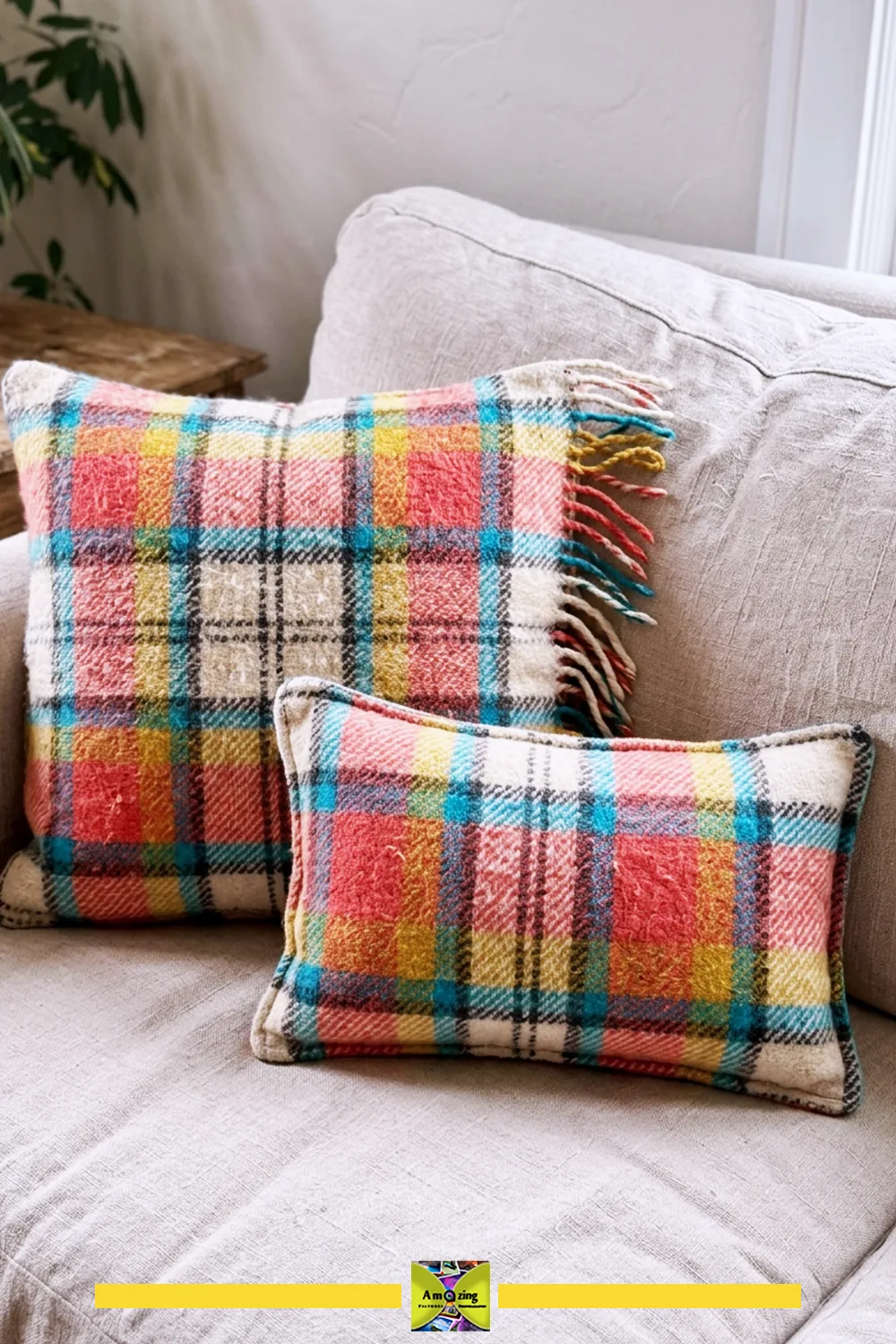 What to do with old blankets: two plaid wool pillow covers in red, yellow and blue on a beige sofa